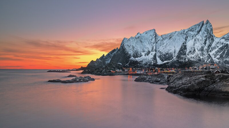Snow-covered Mountains at Sunset — Orange, Serene