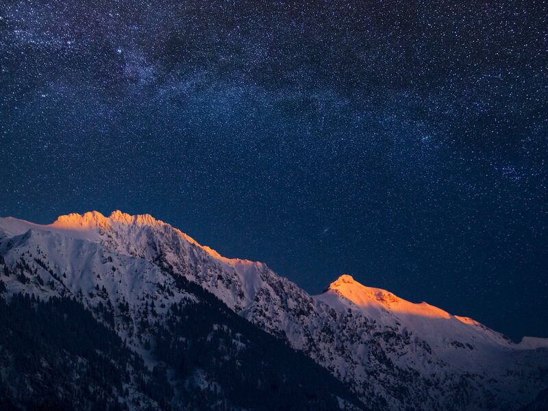 Snow-covered Mountains — Blue, Serene, Night, Photograph, Stars, Sky, Trees, White, Orange