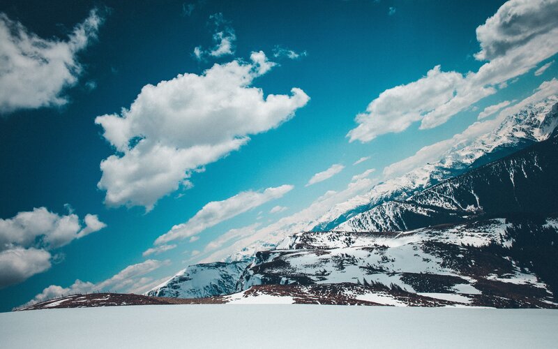 Snow-covered Mountains — Blue, Serene, Winter, Photograph, Clouds, Sky, Mountain Range