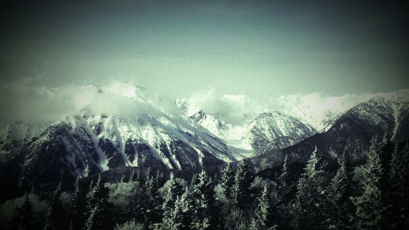 Snow-covered Mountains — Green, Dramatic, Winter, Photograph, Trees, Clouds, Forest