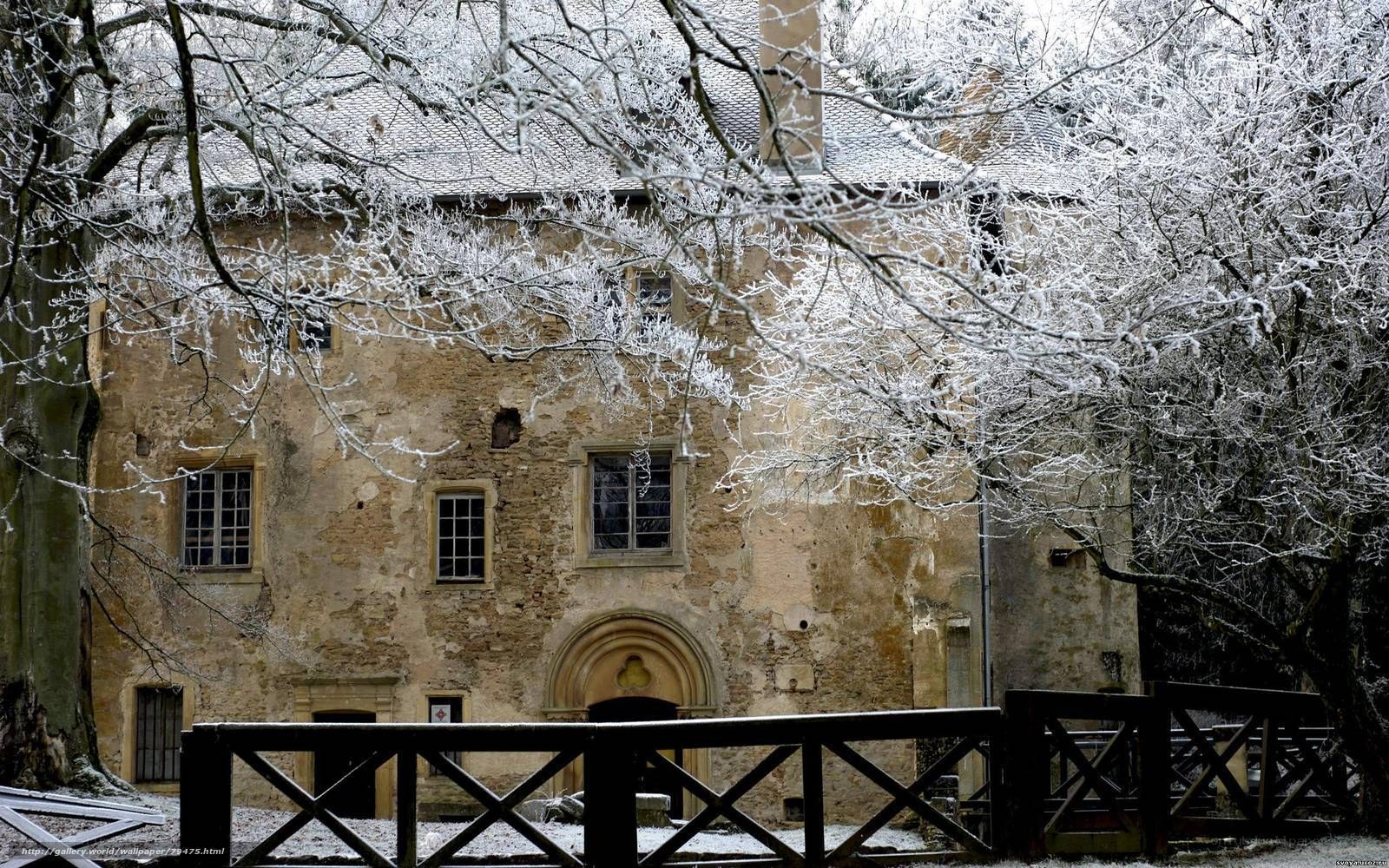 Snow-covered old building