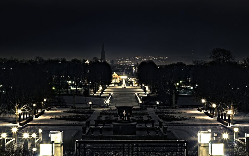 Snow-covered Park at Night — Black, Serene, Photograph, Fountain