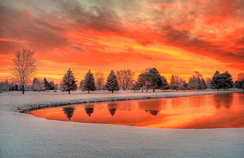 Snow-covered Pond at Sunset