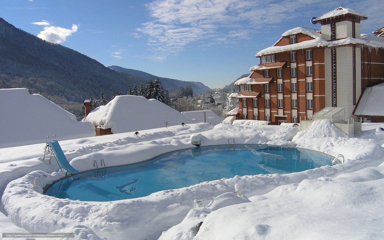Snow-covered pool in mountain resort