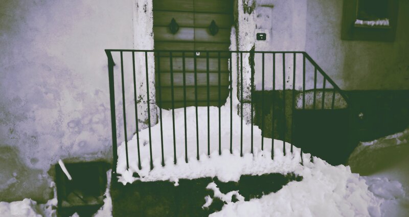 Snow-covered Porch Railing — White