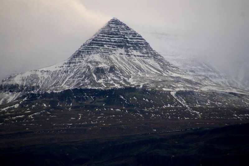 snow-covered pyramid mountain
