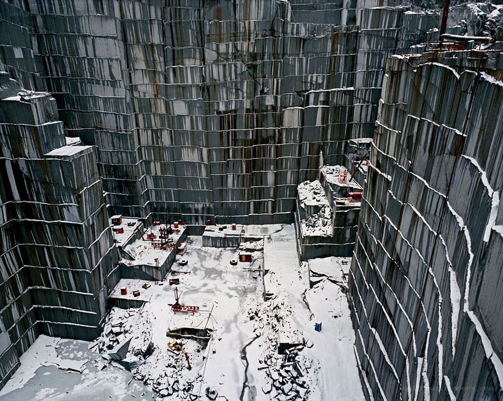 Snow-covered quarry excavation
