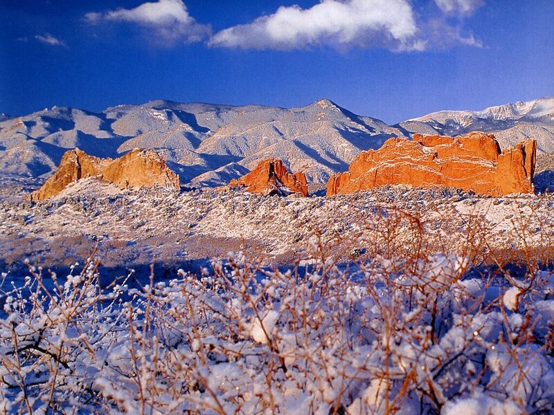 snow-covered red rock formations