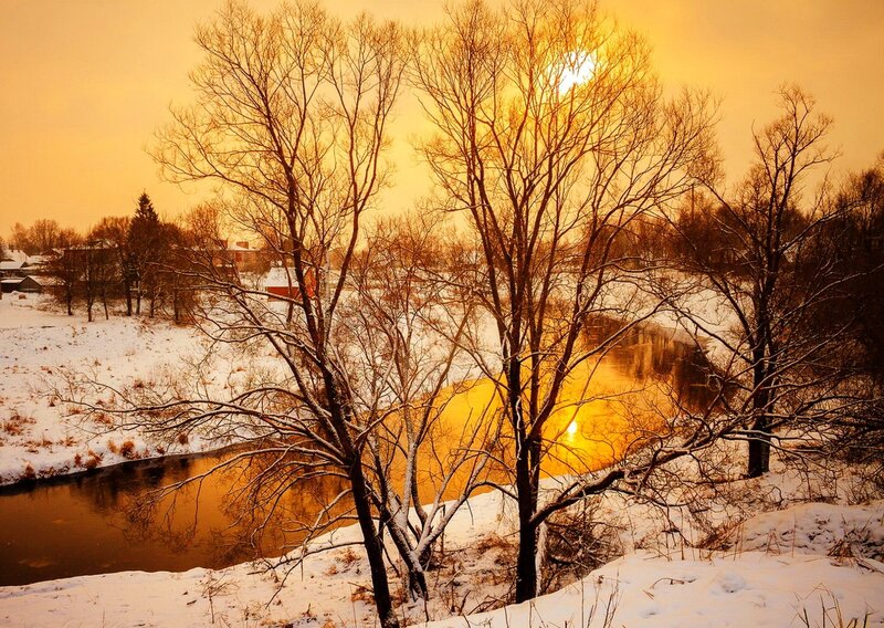 Snow-covered River at Sunset — Gold, Serene