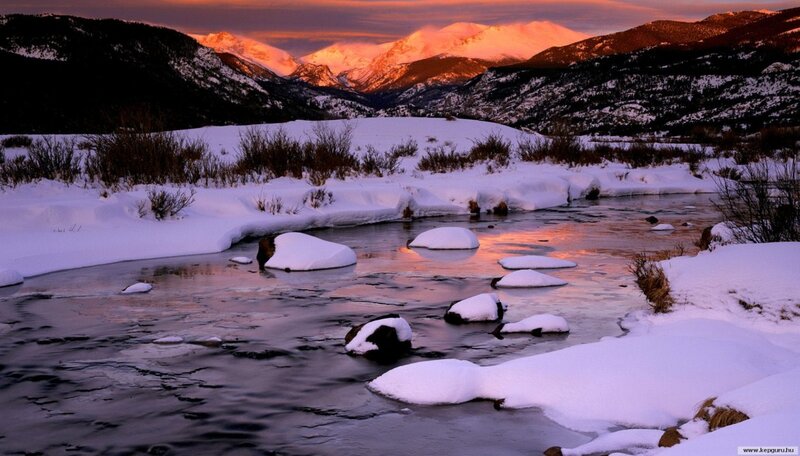 Snow-covered River at Sunset — Orange, Serene, Photograph, Mountains