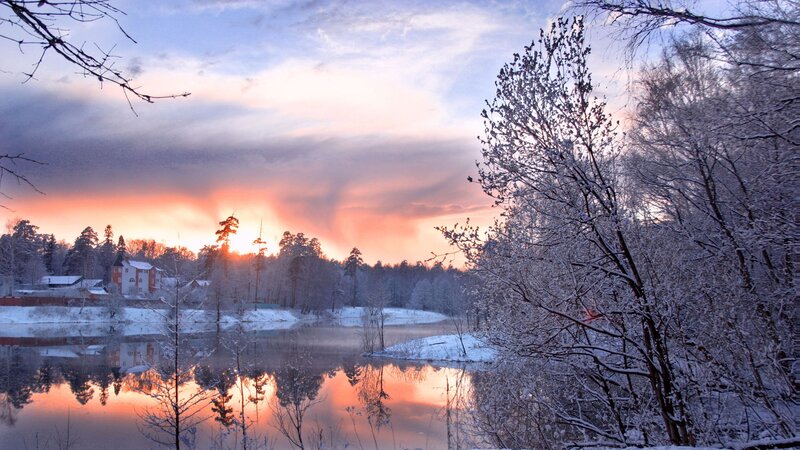 Snow-covered River at Sunset — Orange, Serene, Photograph, Trees, House, Sky