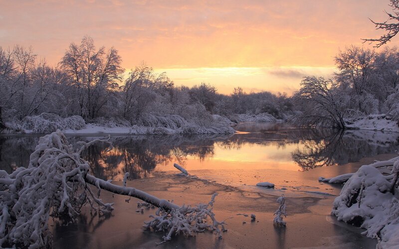 Snow-covered River at Sunset — Orange, Serene, Photograph, Trees, Sky, White, Brown