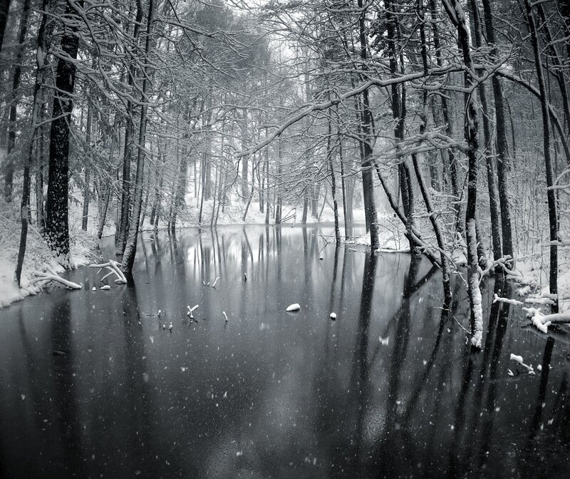 Snow-covered River in Forest — Black, Serene, Winter, Photograph