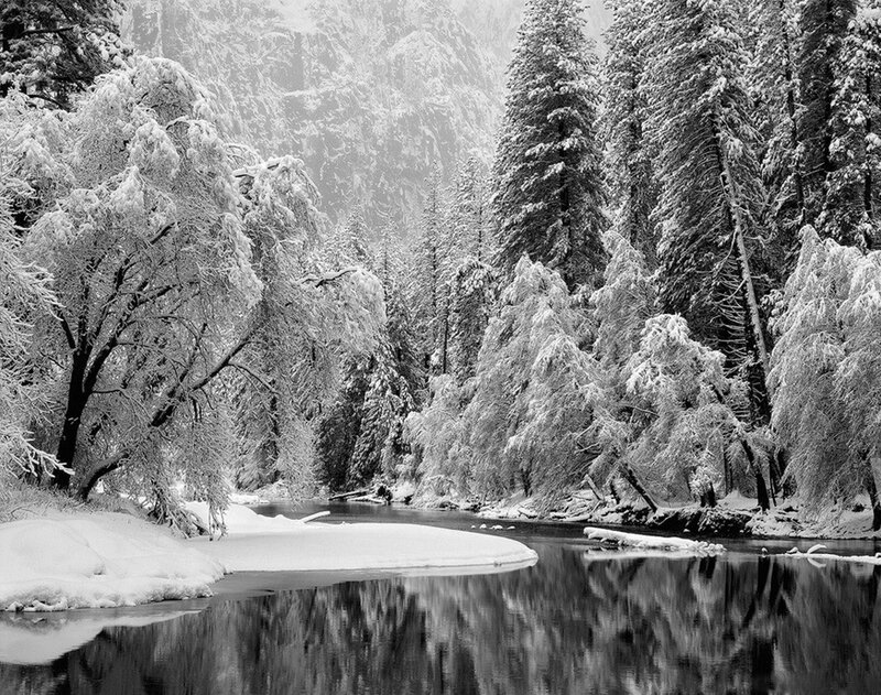 Snow-covered River in Forest — Black, Serene, Winter, Photograph, Trees
