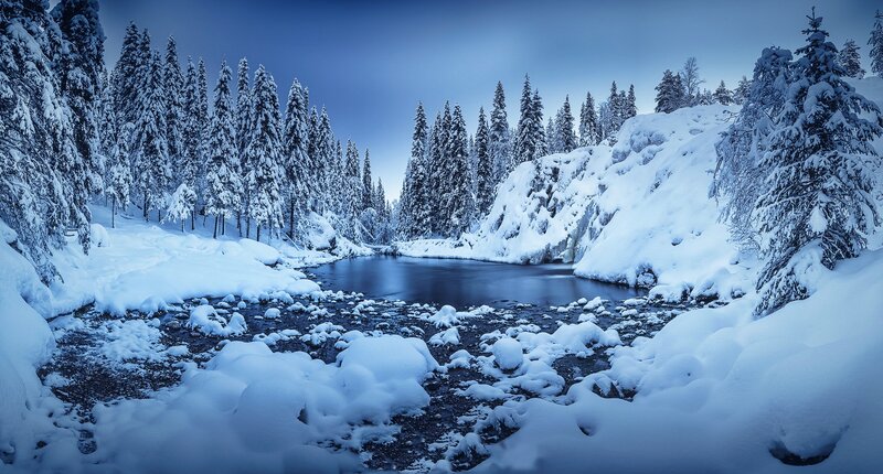 Snow-covered River in Forest — Blue, Serene, Winter, Photograph, Trees, Snow, Rocks
