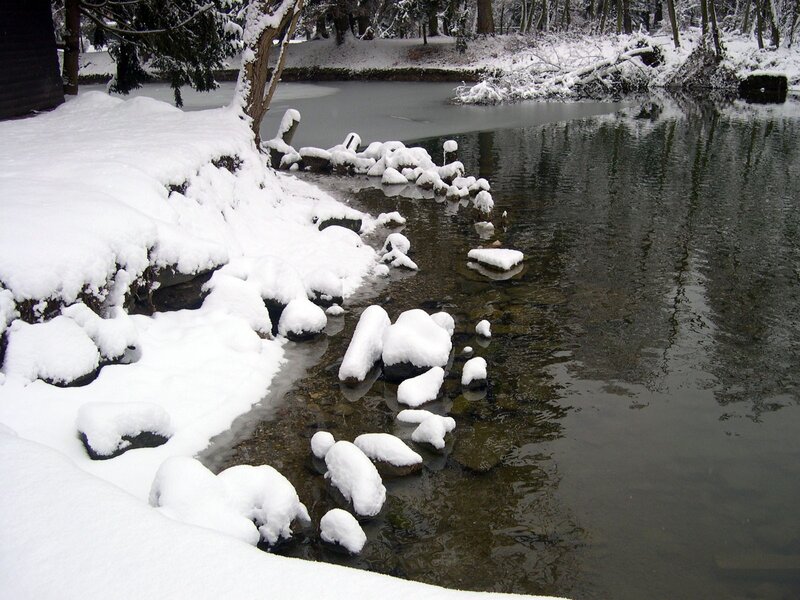 Snow-covered river in winter