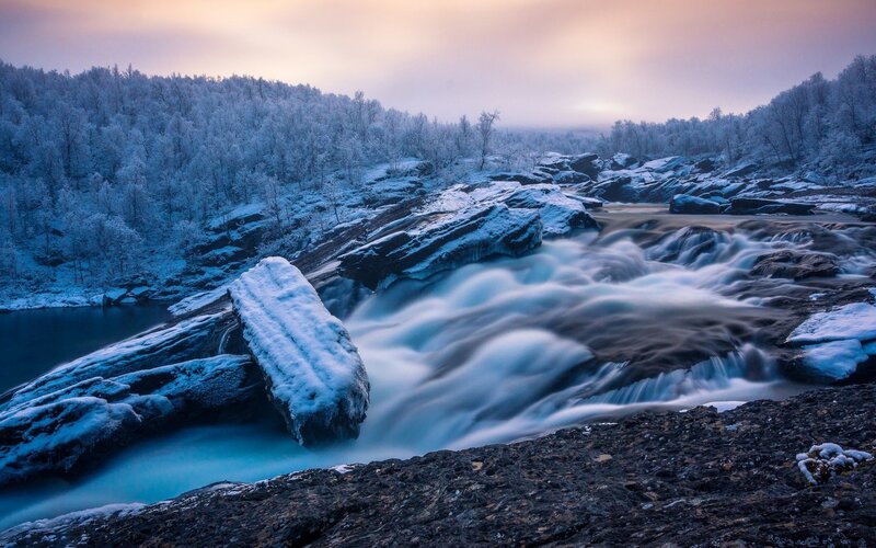 Snow-covered River Rapids