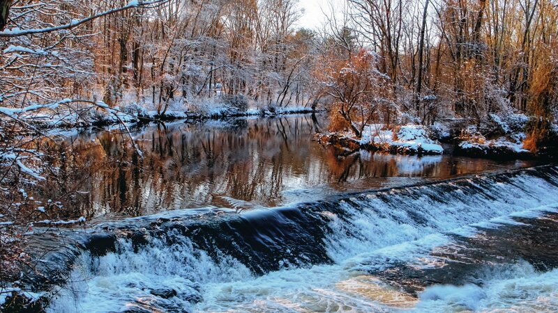 Snow-covered River with Waterfall
