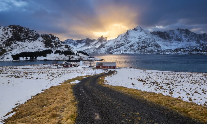 Snow-covered Road and Cabins