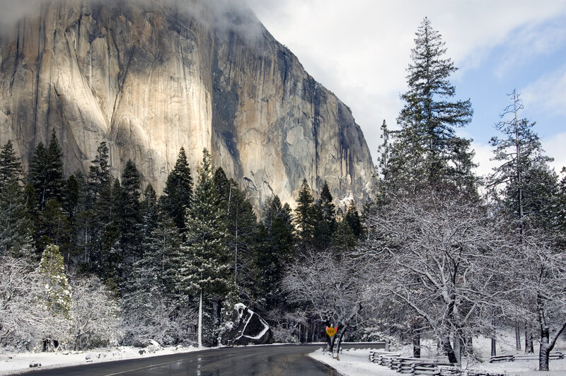 Snow-covered Road and Cliff