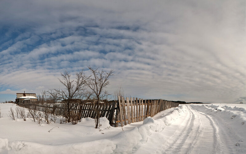 Snow-covered Road and Fence