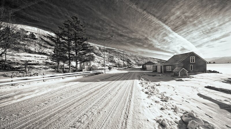 Snow-covered Road and Houses
