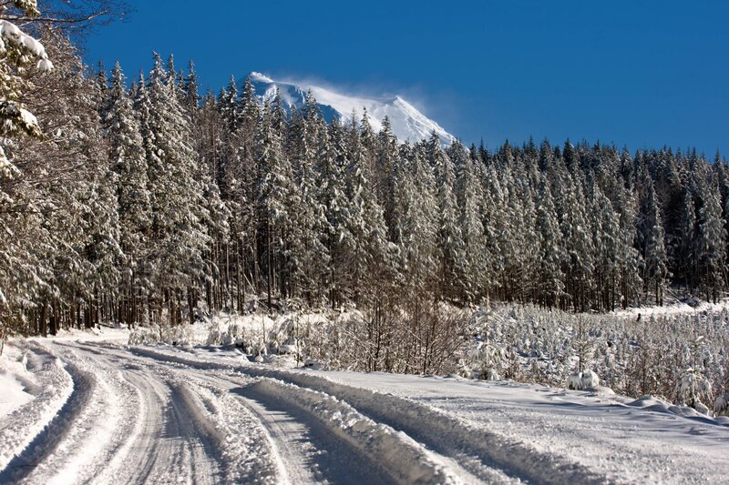 Snow-covered Road and Mountain