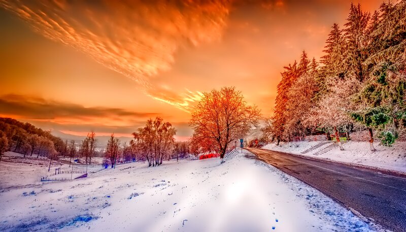 Snow-covered Road at Sunset — Orange, Dramatic
