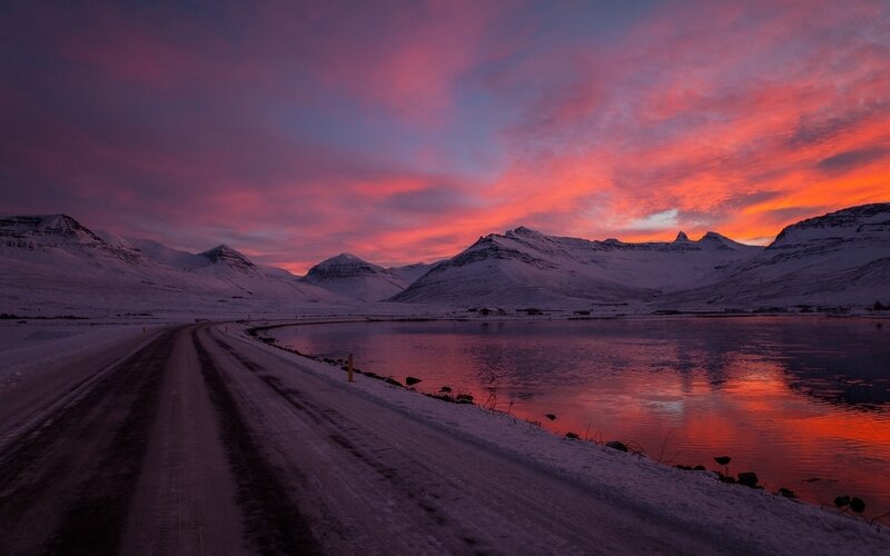 Snow-covered Road at Sunset — Red, Dramatic, Photograph