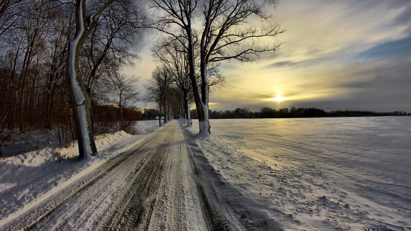Snow-covered Road at Sunset — White, Serene, Photograph