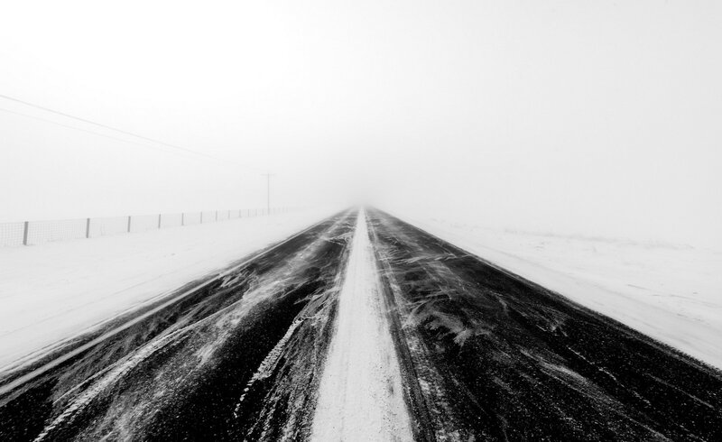 Snow-covered Road — Black, Desolate