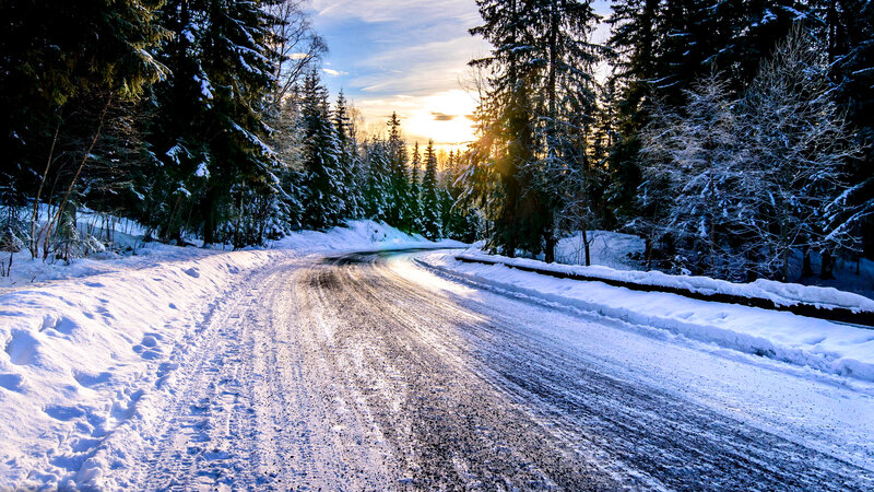 Snow-covered Road in Forest — White, Serene, Sunset