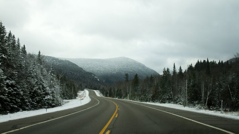 Snow-covered Road in Mountains — Gray