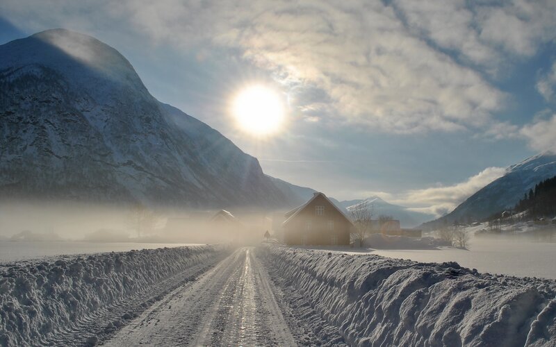 Snow-covered Road in Mountains — White, Serene, Winter