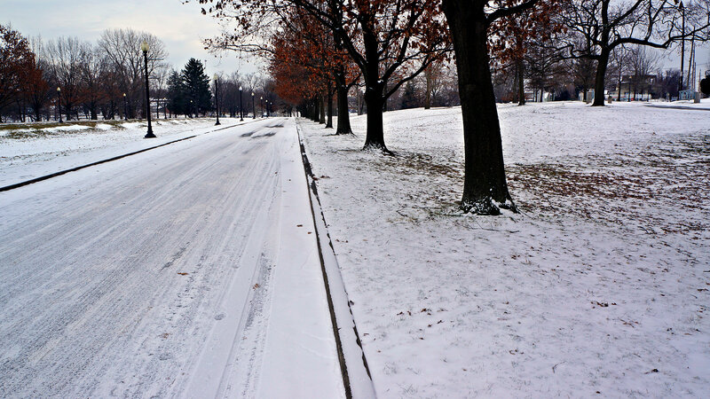 Snow-covered Road in Park