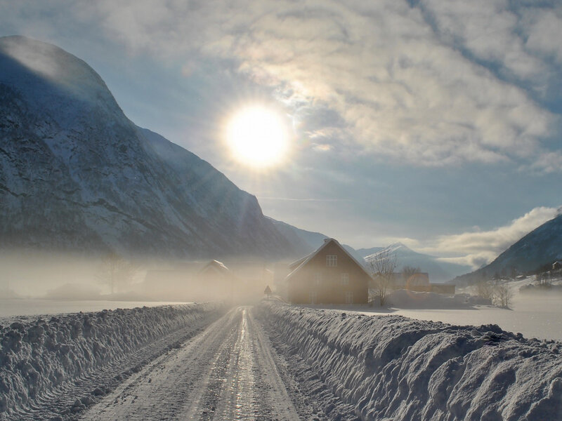 Snow-covered Road in Valley