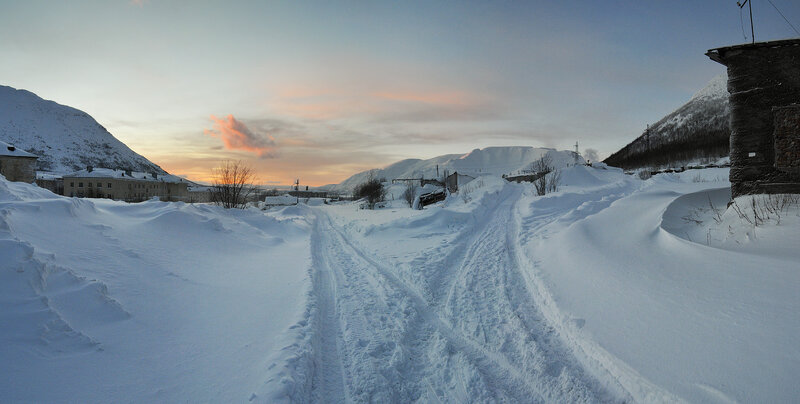 Snow-covered Road in Village