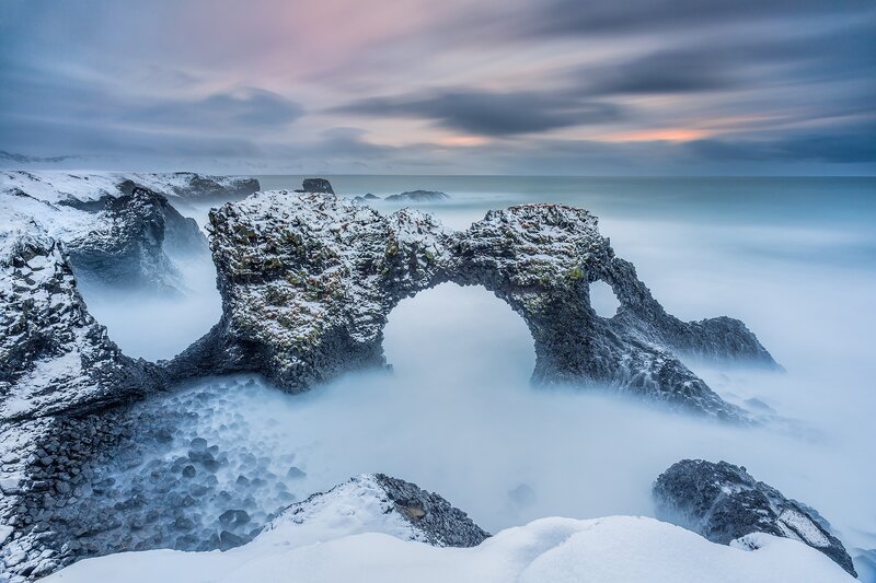 Snow-covered Rock Arch — Blue