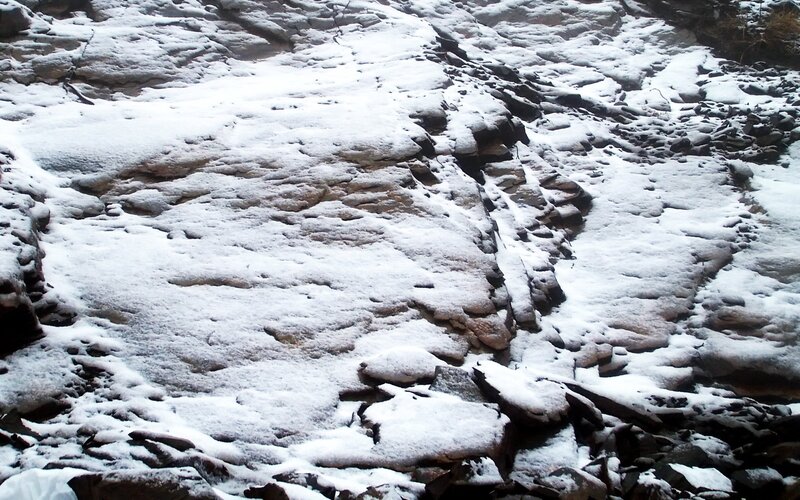 Snow-covered Rock Face