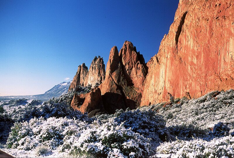 Snow-covered Rock Formations — Red