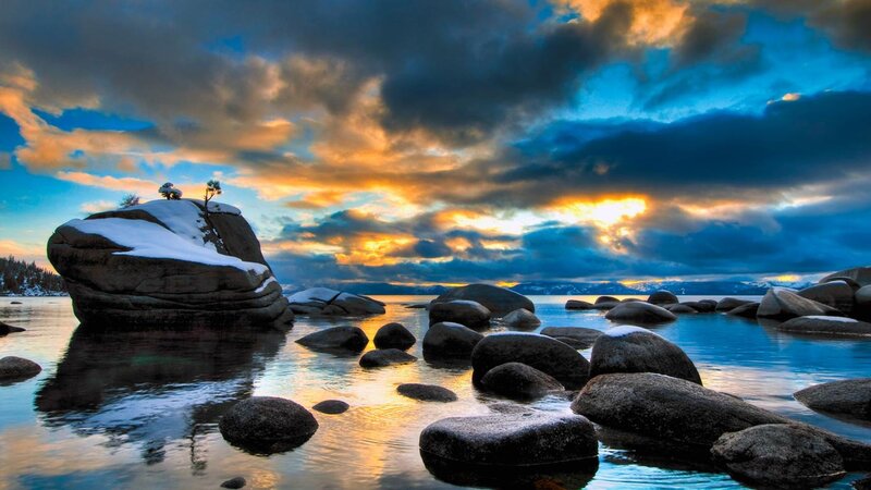 Snow-covered Rock in Lake