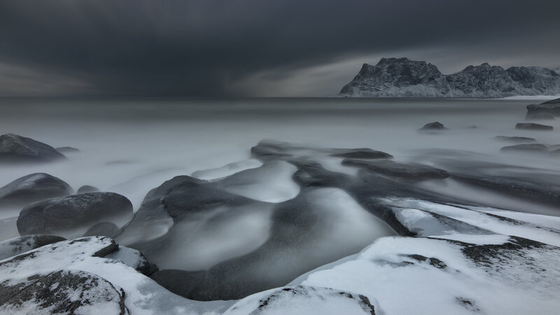 Snow-covered Rocks at Coast