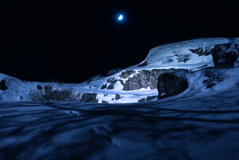 Snow-covered Rocks at Night