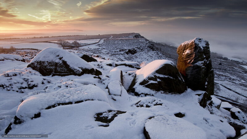 Snow-covered Rocks at Sunrise