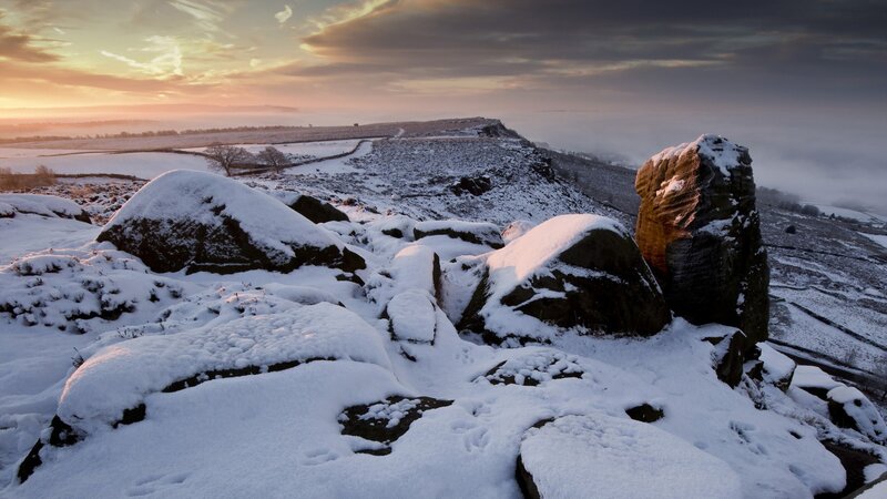 Snow-covered Rocks at Sunrise — White