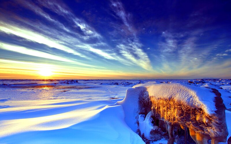 Snow-covered Rocks at Sunset — Blue, Dramatic, Photograph, Sun