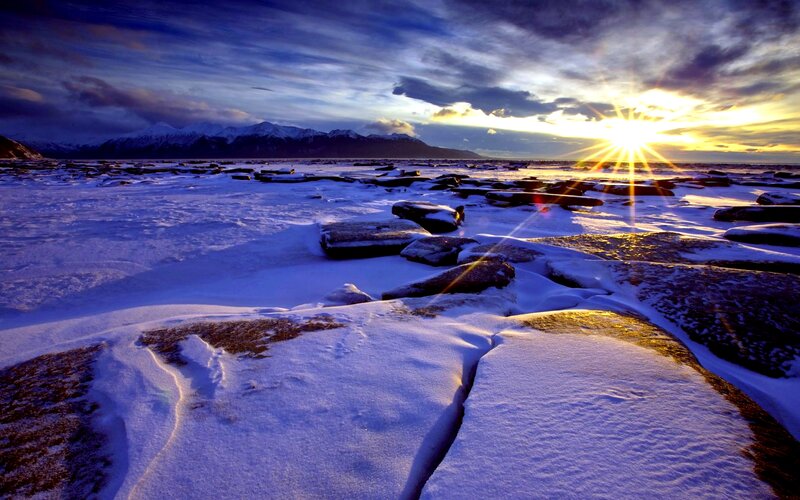 Snow-covered Rocks at Sunset — Blue, Dramatic, Photograph
