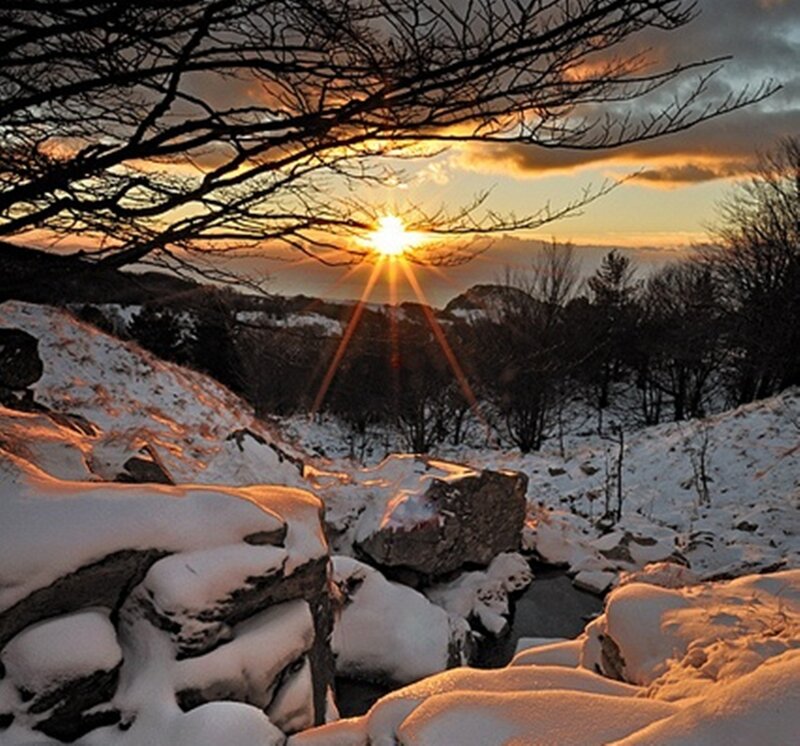 Snow-covered Rocks at Sunset — Orange, Serene, Photograph
