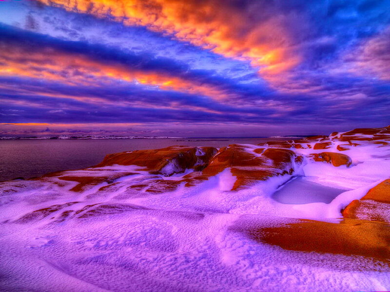 Snow-covered Rocks at Sunset — Purple, Dramatic, Photograph