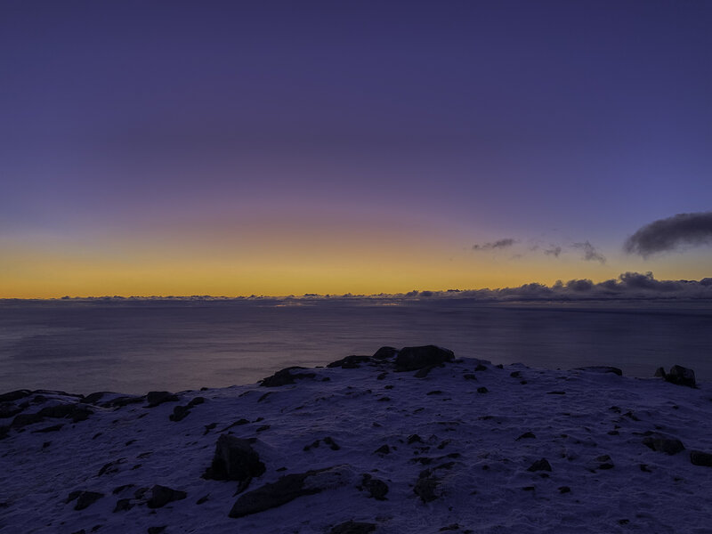 Snow-covered Rocks at Sunset — Purple, Serene